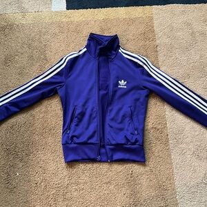 Adidas purple track jacket.
